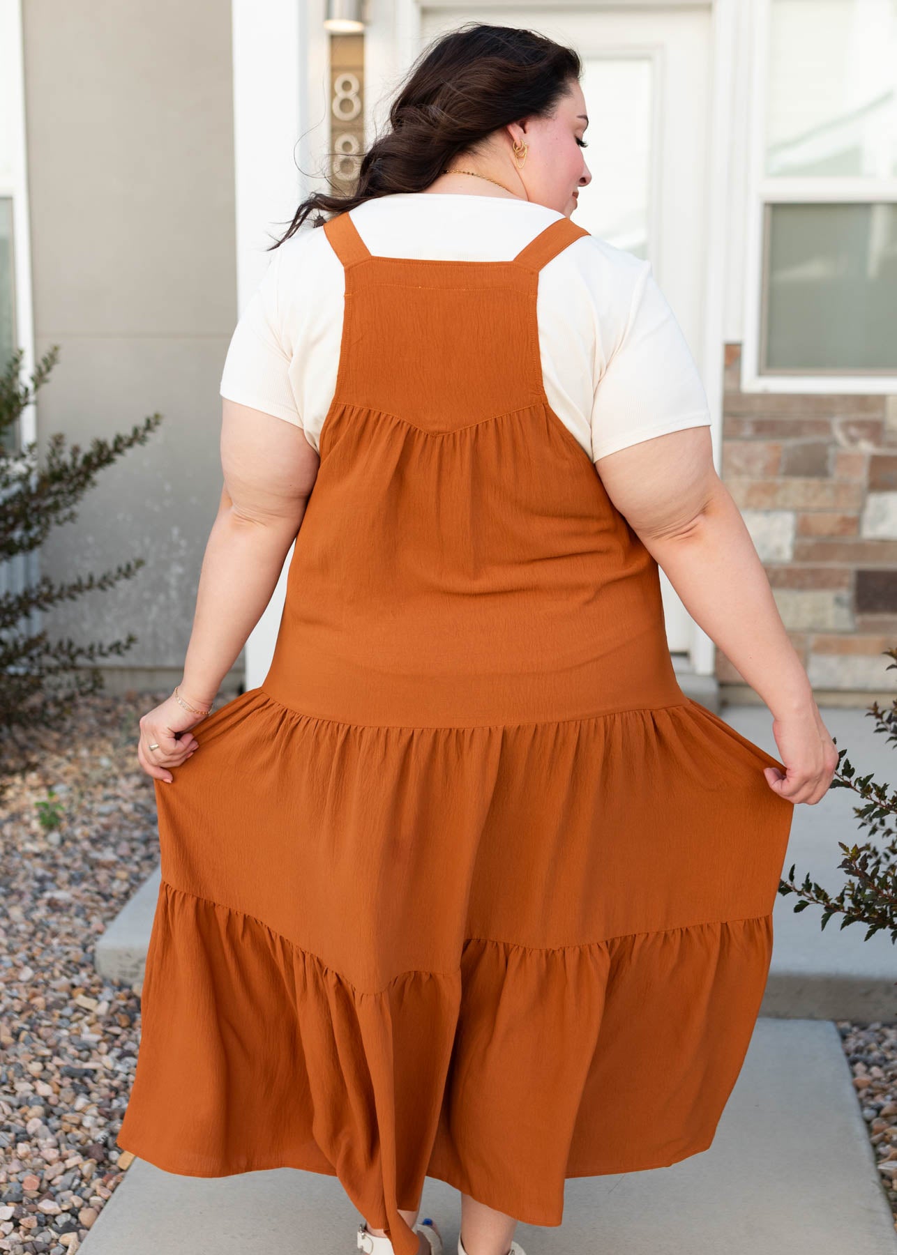 Back view of the plus size toffee overall dress in plus size