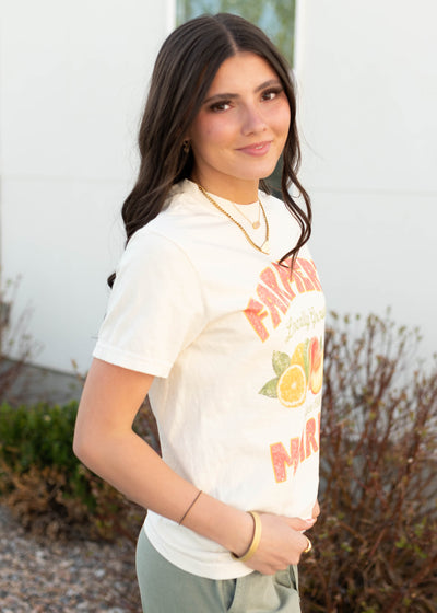 Side view of the farmers market graphic tee