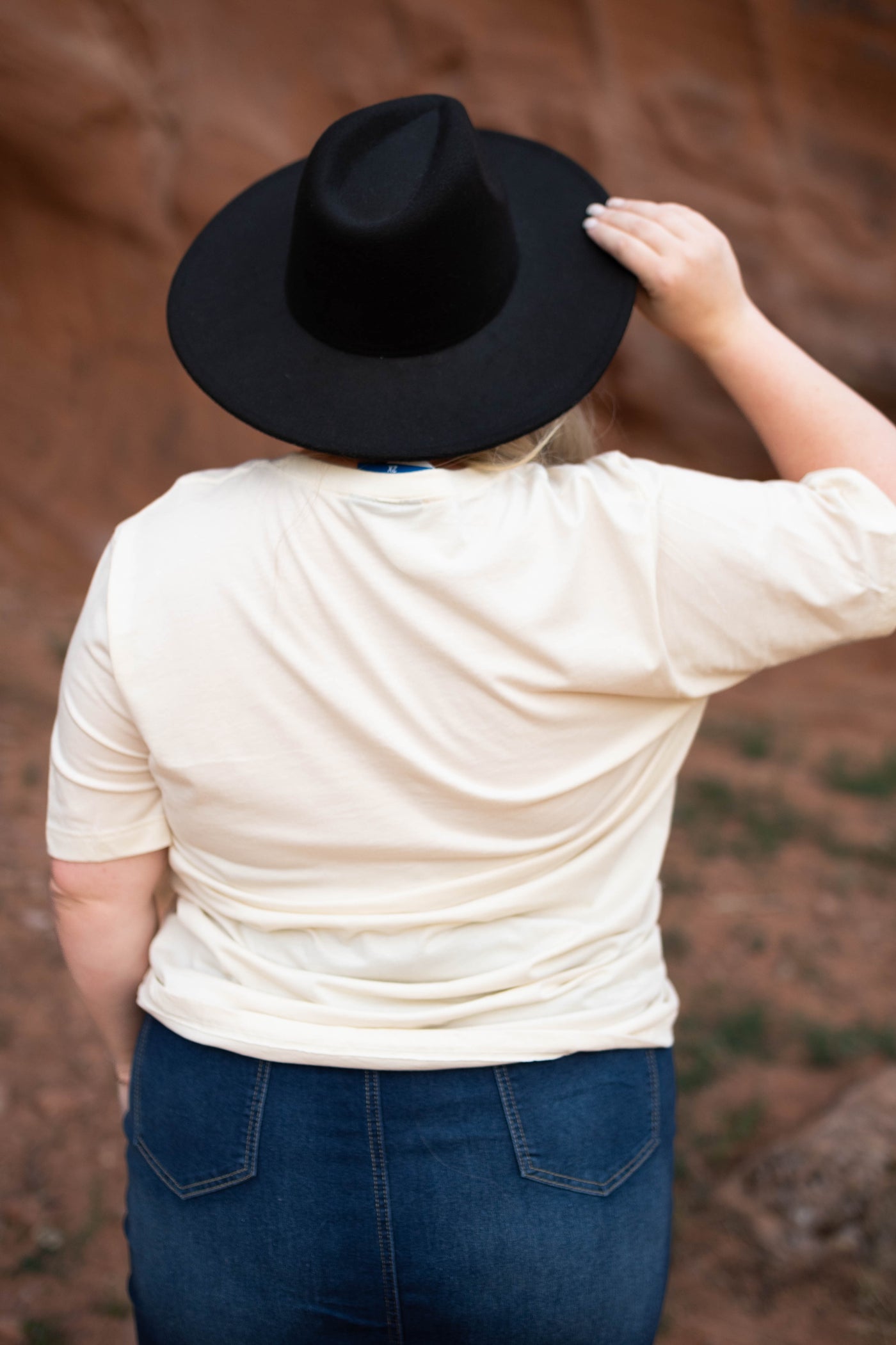 Back view of a plus size ivory tee