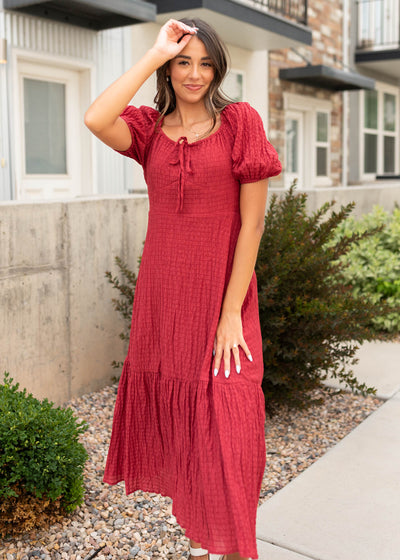 Short sleeve modest burgundy textured dress with round neck and bow
