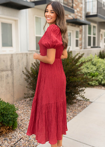 Side view of the modest burgundy textured dress