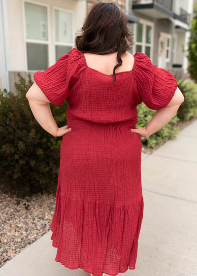 Back view of the modest plus size burgundy textured dress