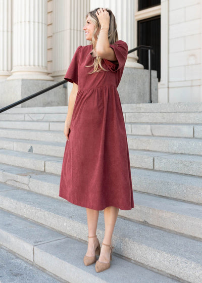 Dusty maroon dress in sizes small to x-large
