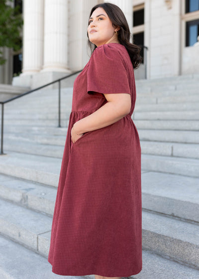 Side view of the plus size modest duty maroon dress at Lena Layne