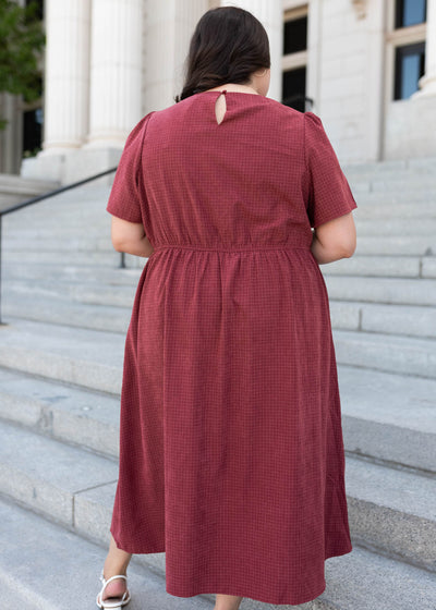 Back view of the plus size dusty maroon dress