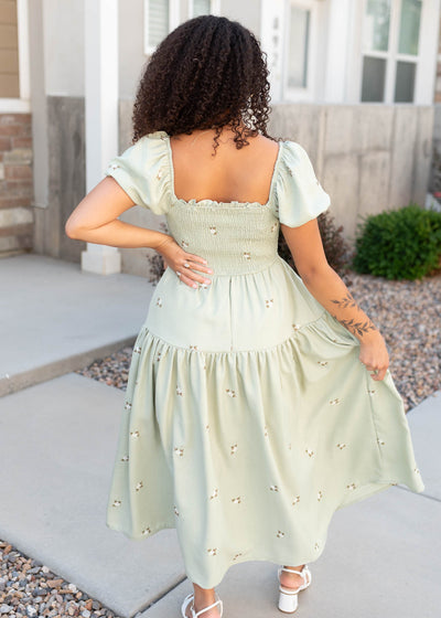 Back view of the olive puff sleeve dress