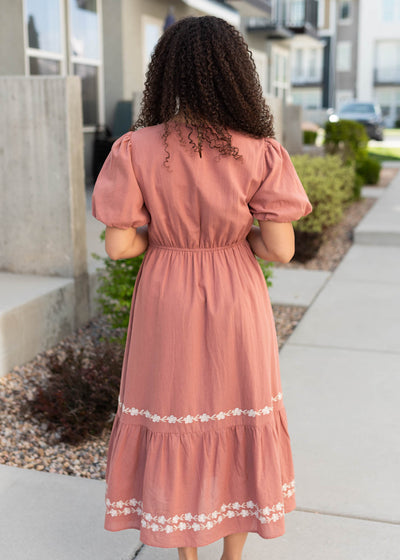 Back view of the dark rose embroidered dress