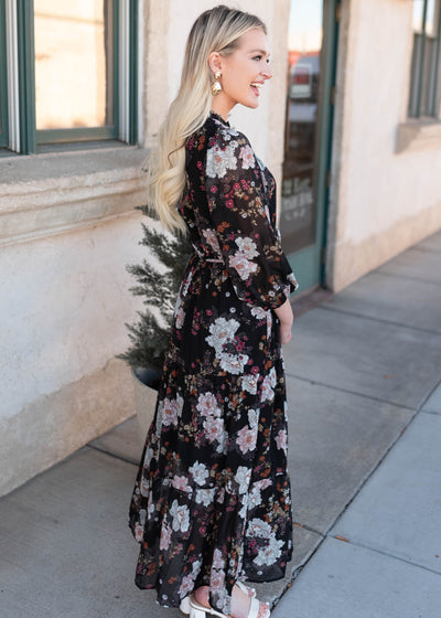 Side view of the modest black floral dress 