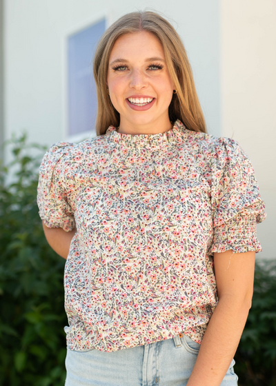 Pink floral top with elastic on the short sleeves