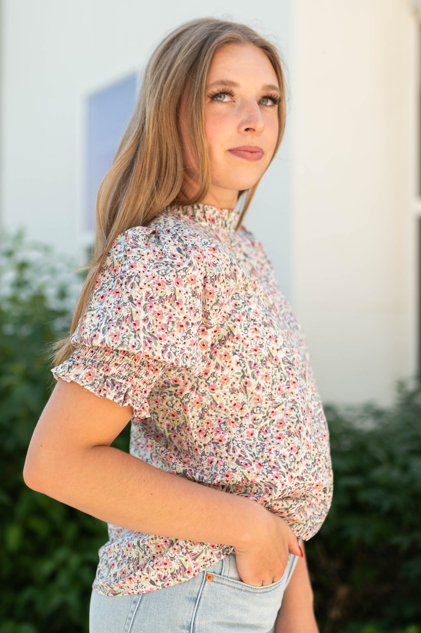 Side view of a pink floral top