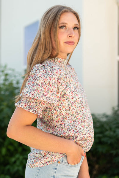 Side view of a pink floral top