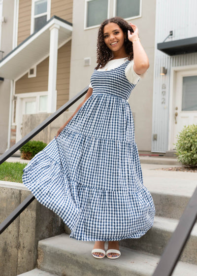 Navy gingham sleeveless dress with a tiered skirt