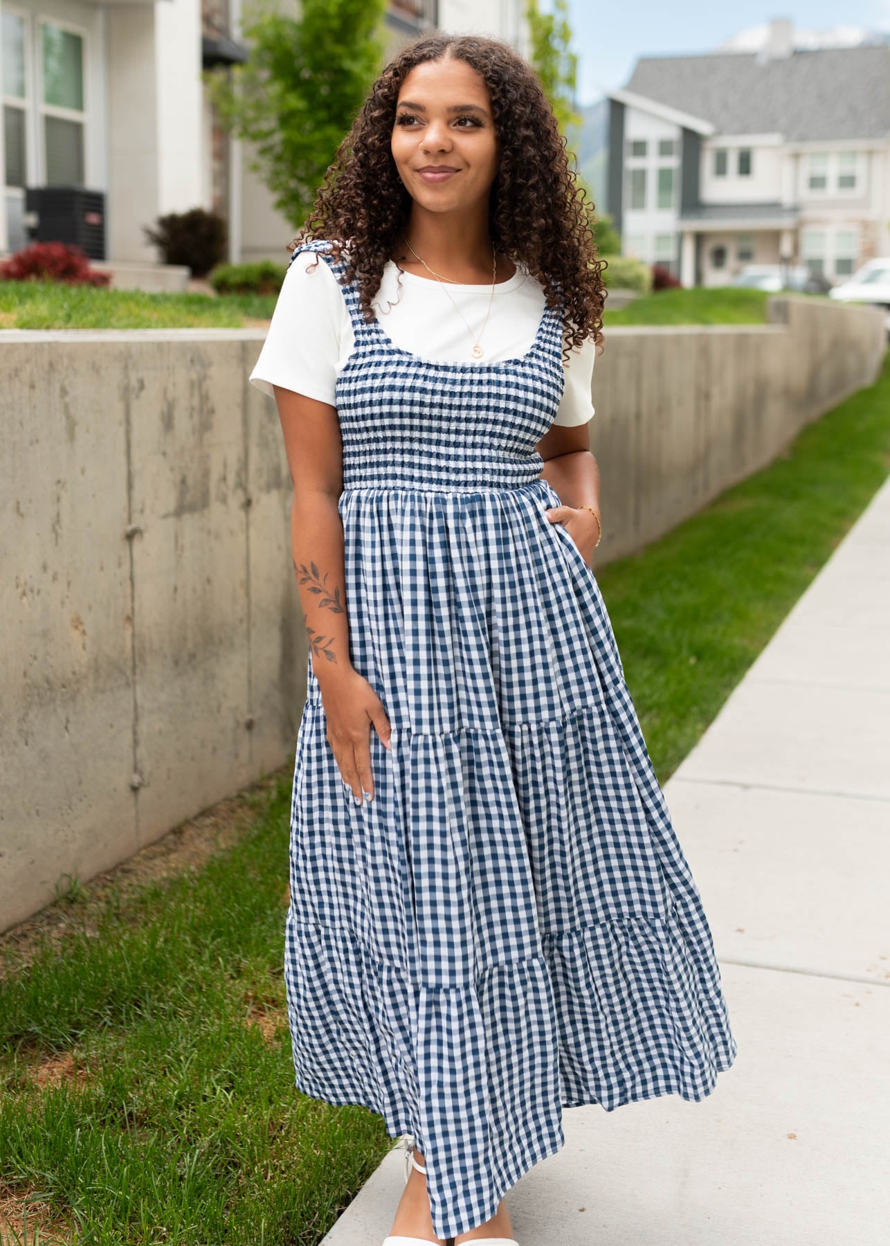 Tiered skirt on the navy gingham sleeveless dress