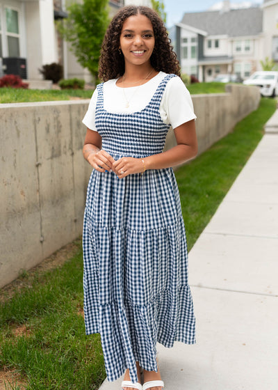 Smocked bodice on the navy gingham sleeveless dress