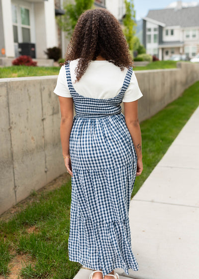 Back view of the navy gingham sleeveless dress