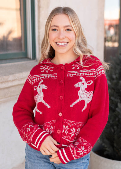 Red patterned cardigan with deer and snowflakes