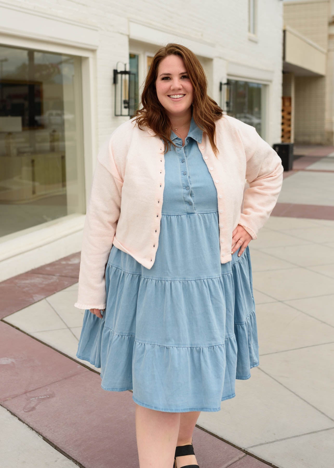 Plus size light pink cardigan with ruffle on the cuffs and collar