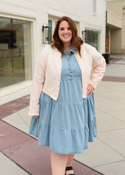 Plus size light pink cardigan with ruffle on the cuffs and collar