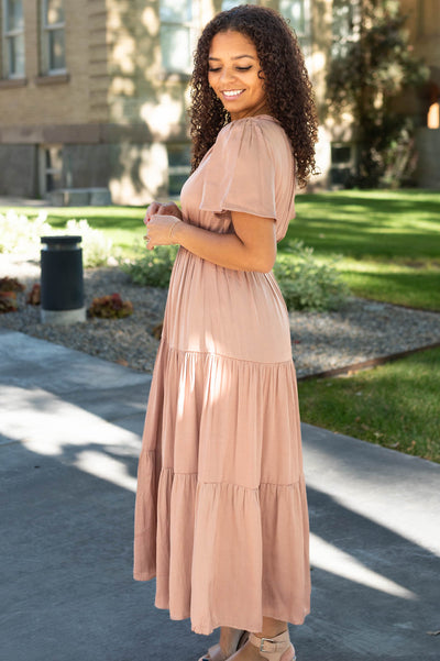 Side view of a short sleeve coffee dress