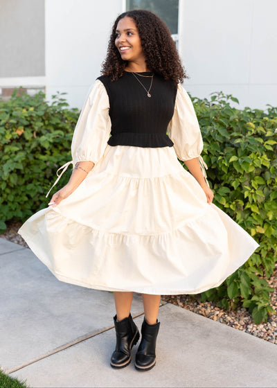 Modest black sweater vest dress with short sleeves