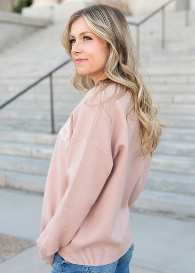 Side view of the happiness blush sweater