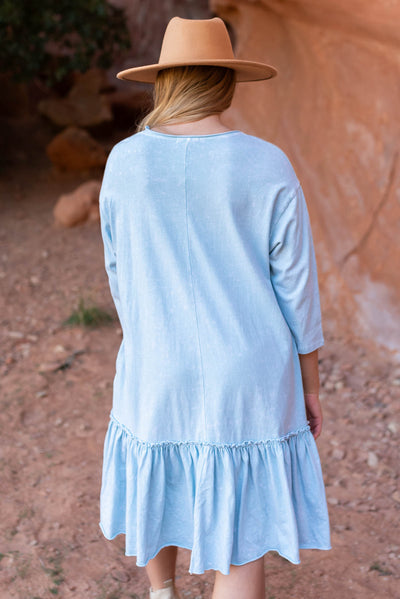 Back view of a sky blue dress
