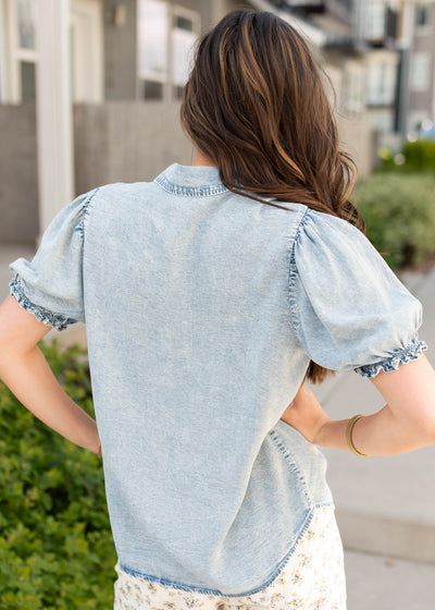 Back view of the chambray puff sleeve shirt