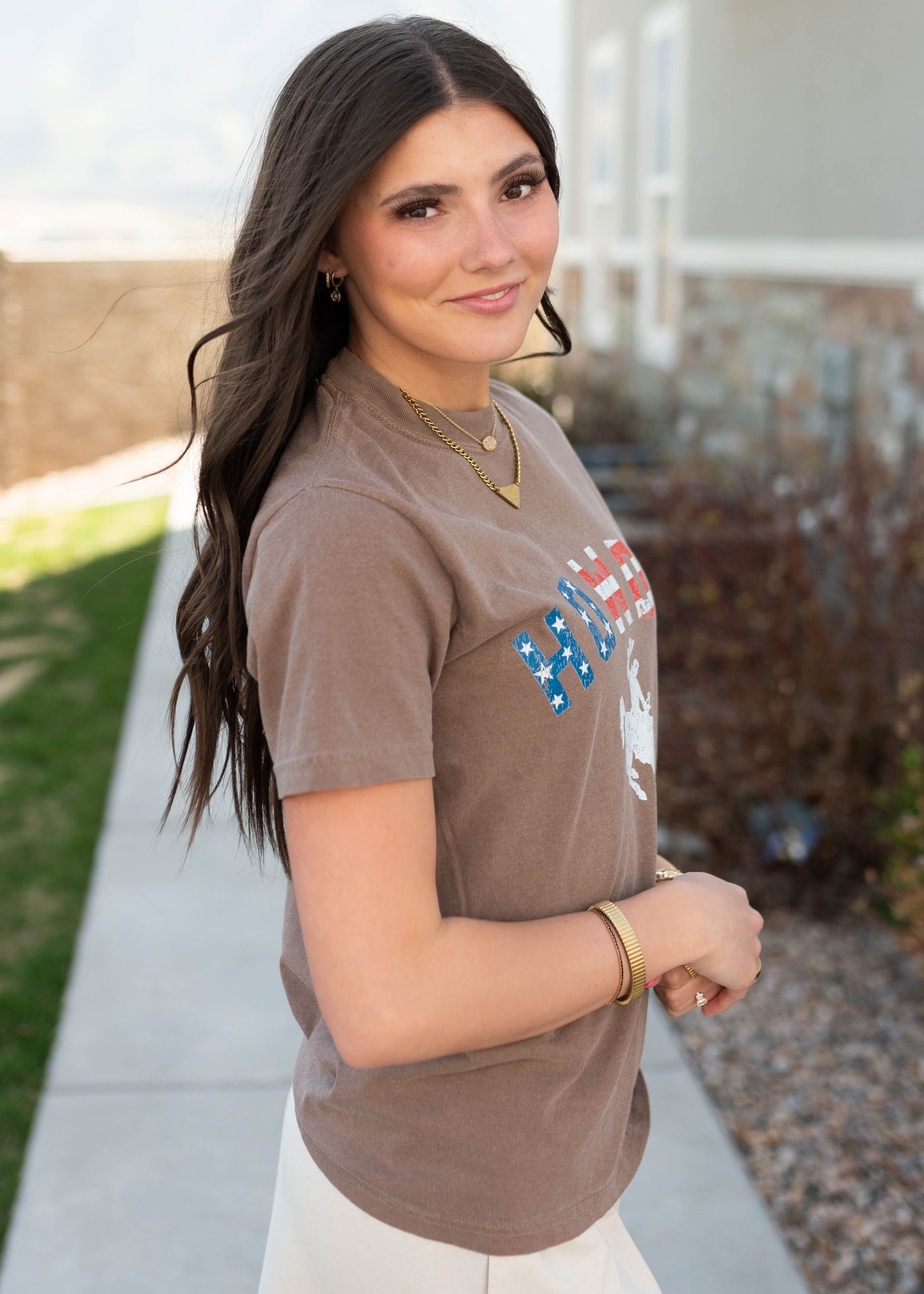 Side view of the howdy cowboy graphic tee