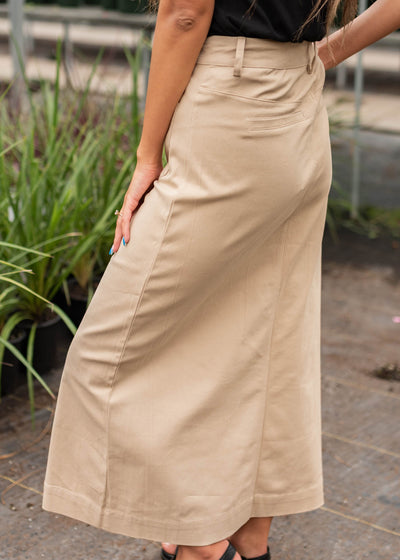 Side view of the taupe button down skirt
