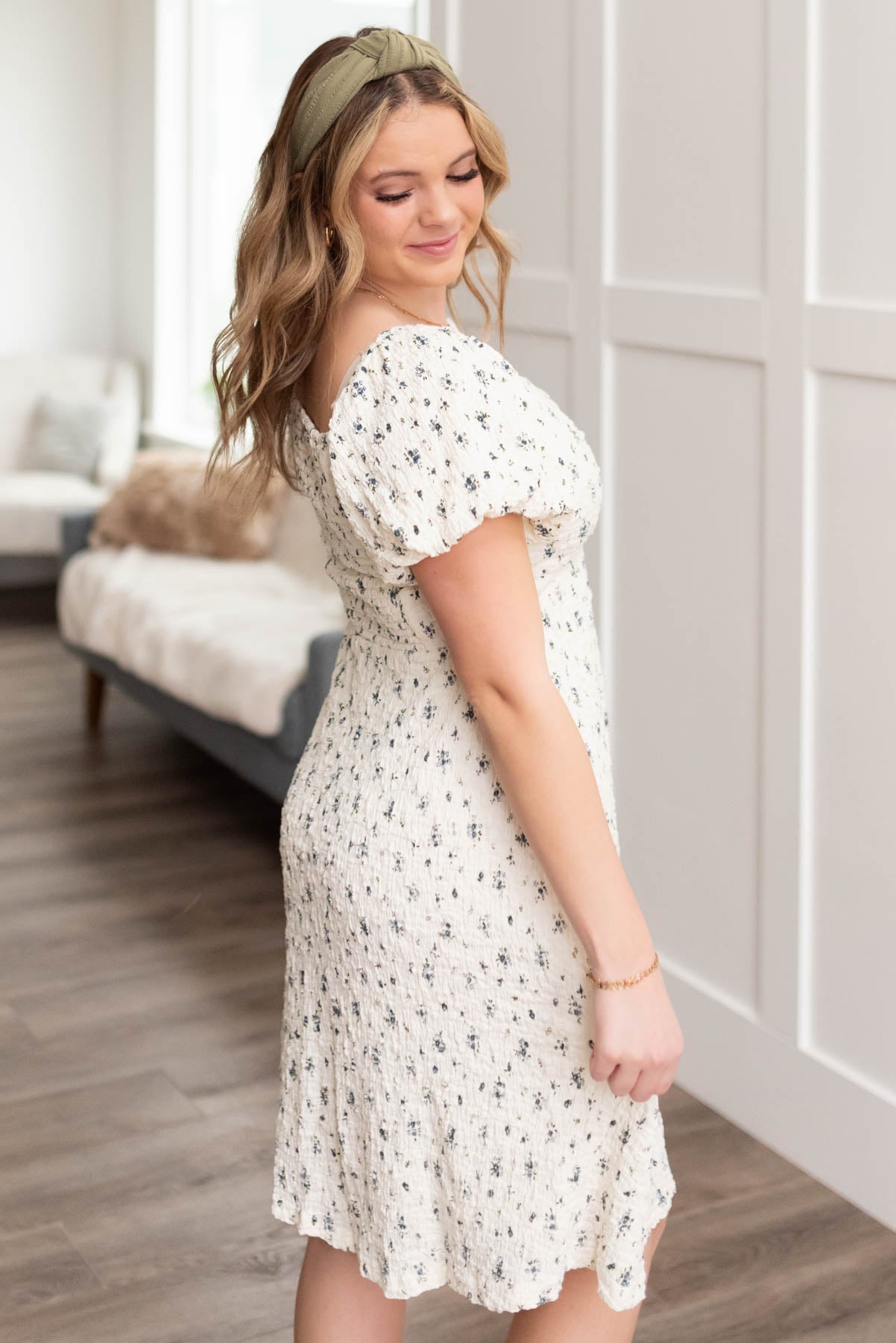 Side view of the ivory floral dress