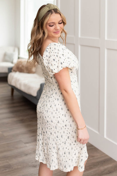 Side view of the ivory floral dress