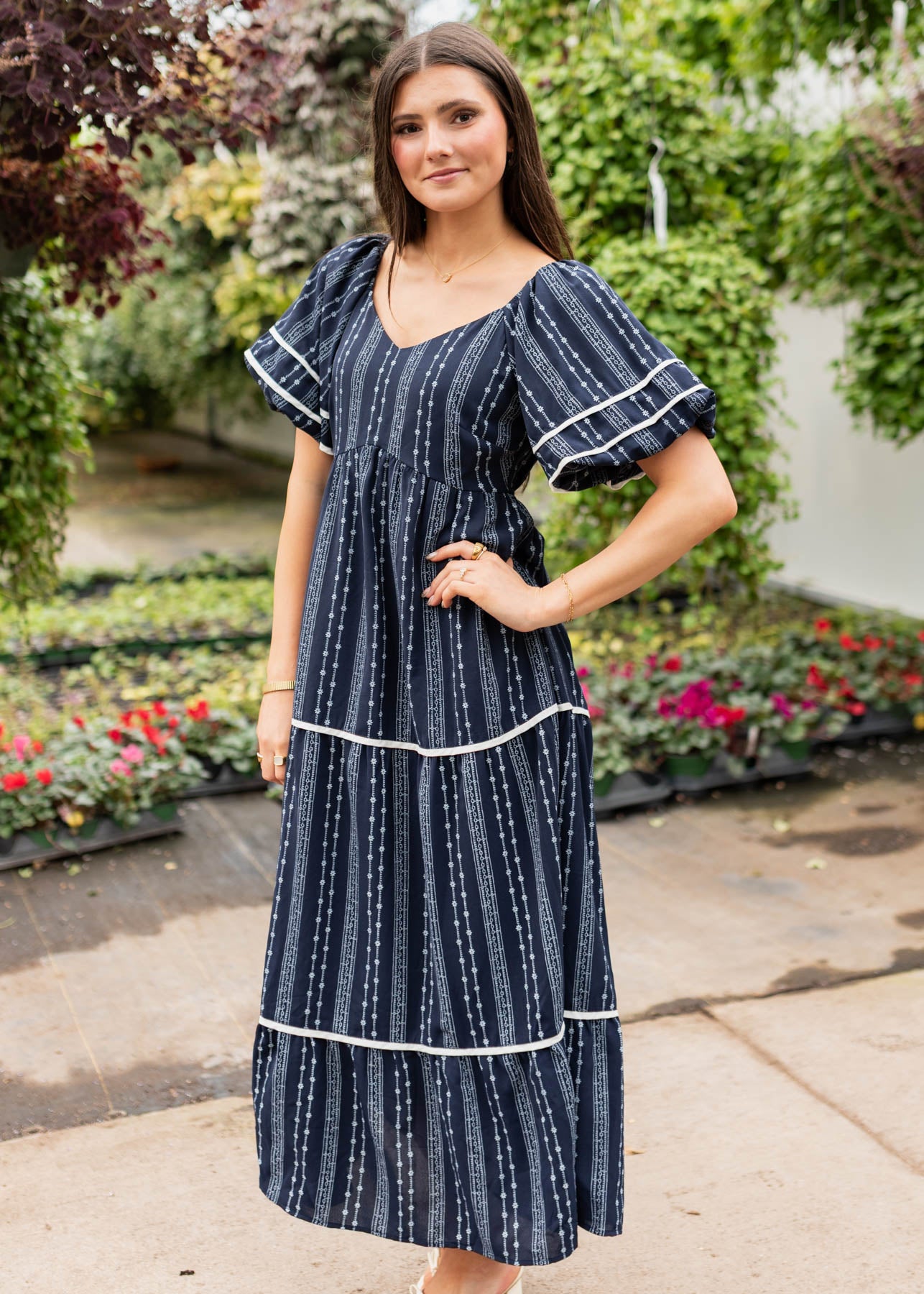 Side view of the navy floral pattern dress