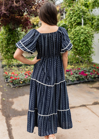 Back view of the navy floral pattern dress