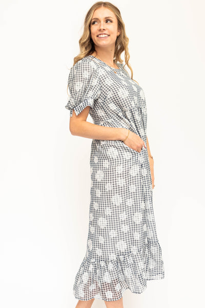 Side view of a navy floral dress
