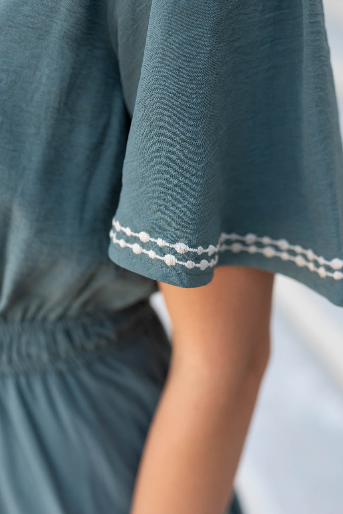 jade embroidered dress with embroidery on the sleeve