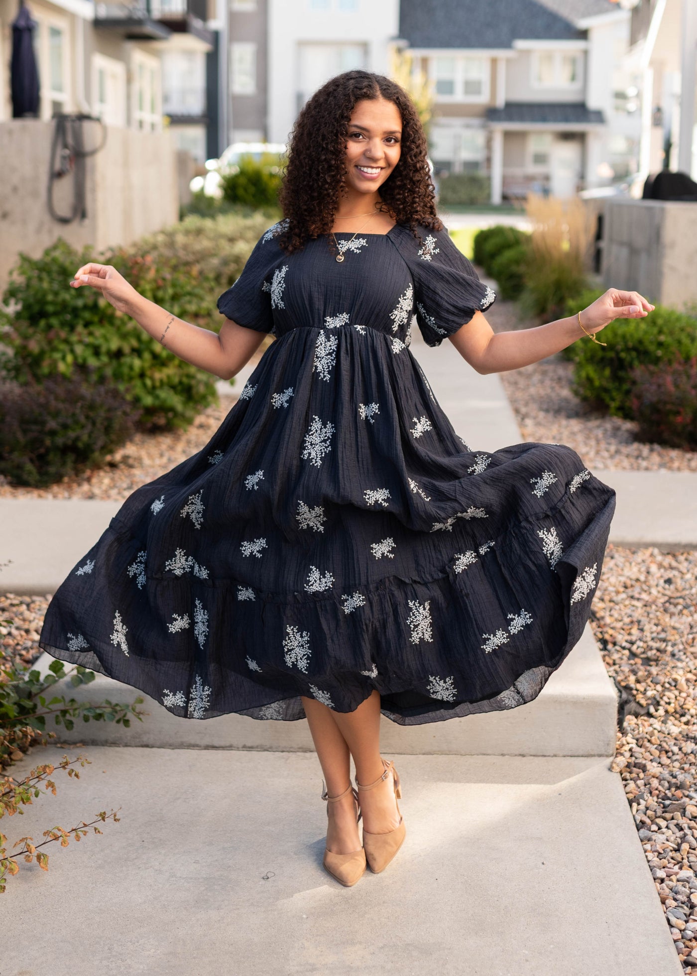 High waisted navy embroidered dress with short sleeves