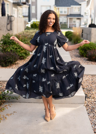 High waisted navy embroidered dress with short sleeves