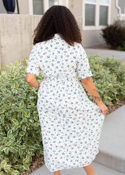 Back view of the white floral button down dress