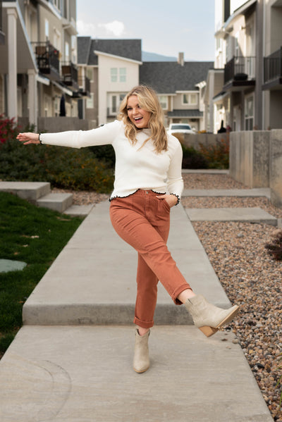 Front view of the washed brown pants with pockets