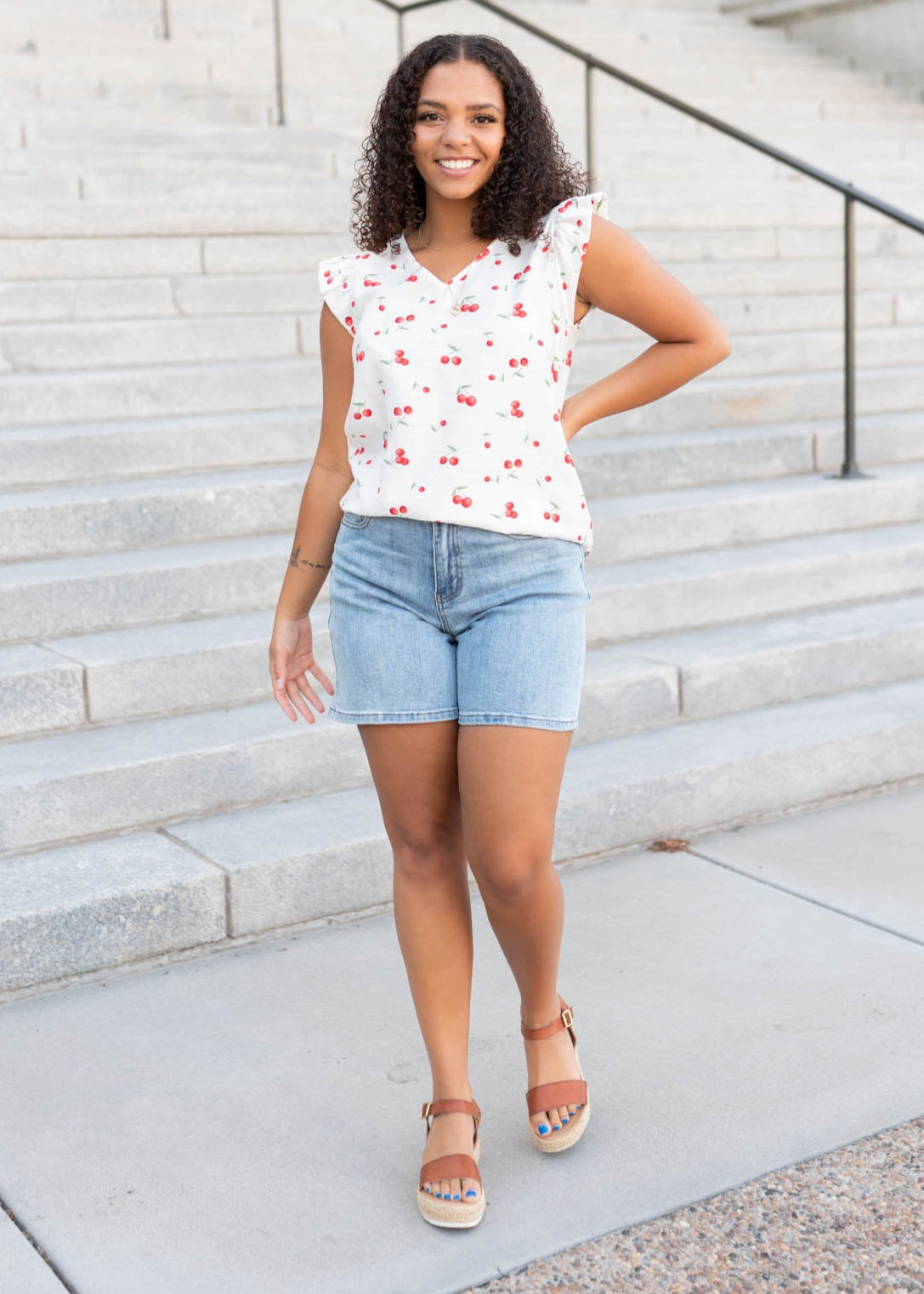 Sleeveless white cherry top