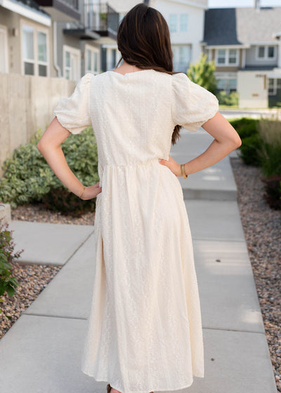 Back view of the cream embroidered dress