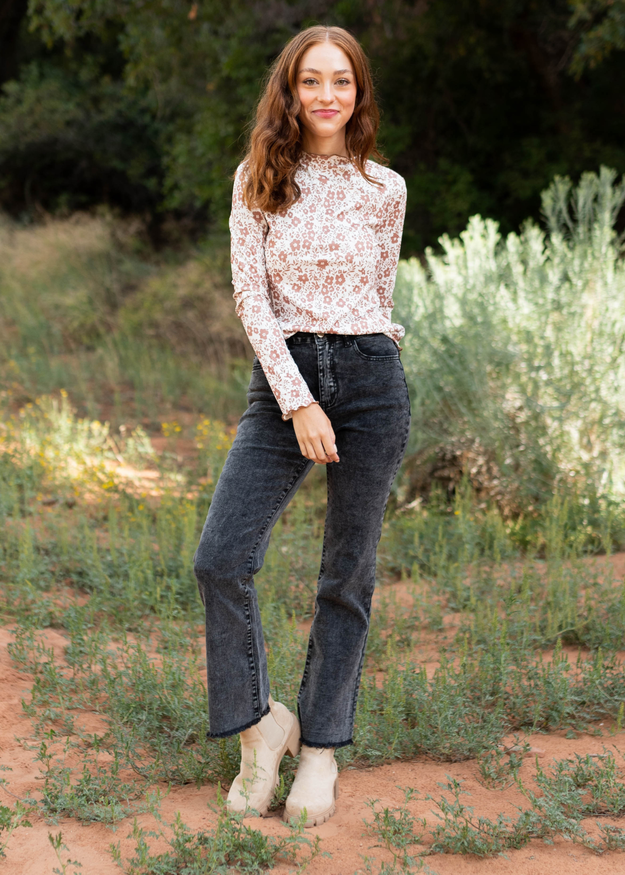 Straight leg black pants with distressed hem