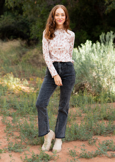 Straight leg black pants with distressed hem
