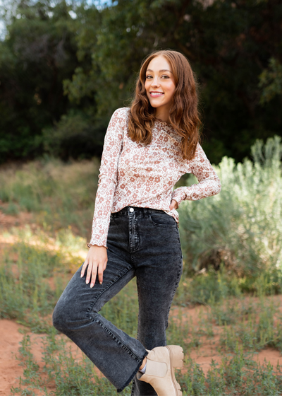 Black pants with a distressed hem