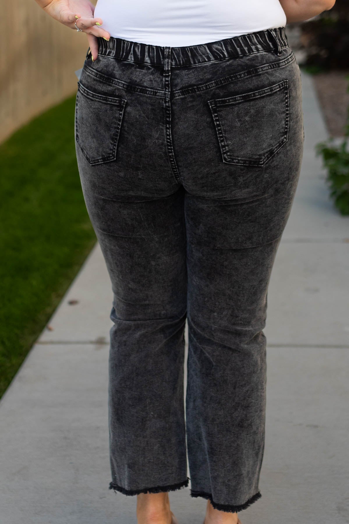 Back view of plus size black pants