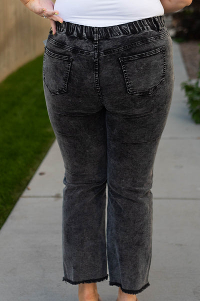 Back view of plus size black pants