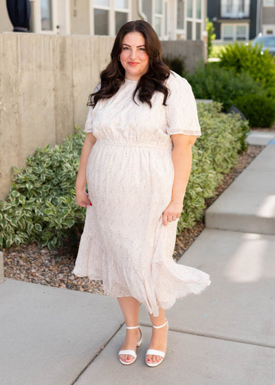 Plus size biege floral dress with short sleeves