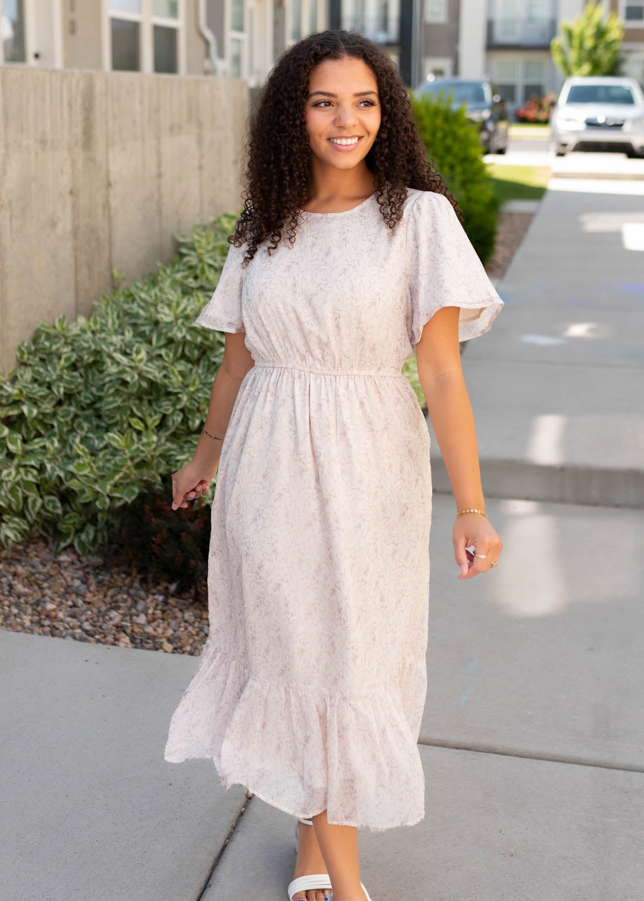 Beige floral dress with short sleeves