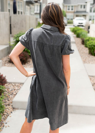 Back view of the black button down dress
