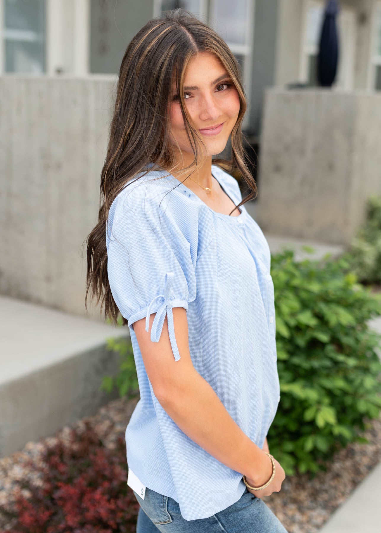 Side view of the blue mini checkered top